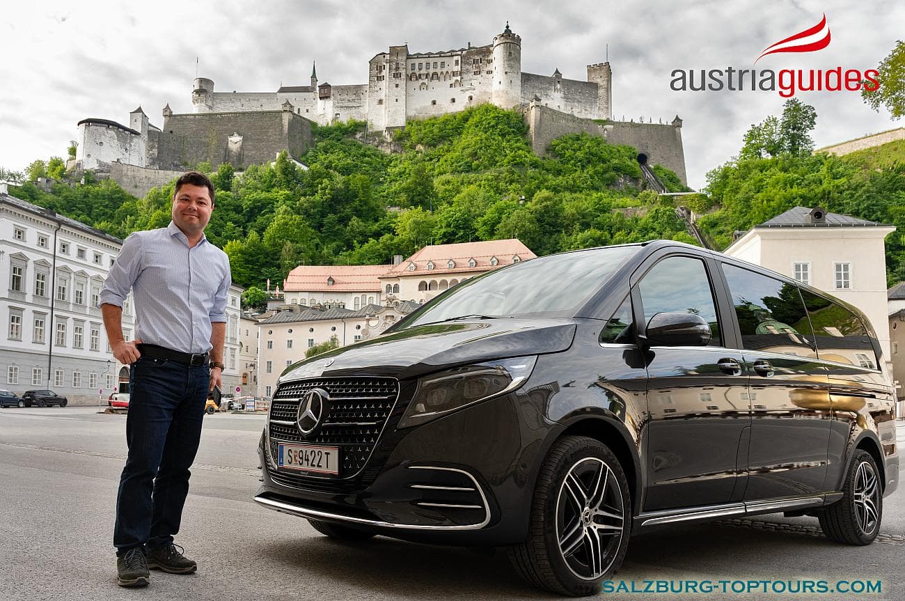 Private Salzburg tour guide Eugene Gumennikov with Mercedes-Benz V-Class Certified Austria Guide Eugene Gumennikov beside Mercedes-Benz V-Class in Salzburg